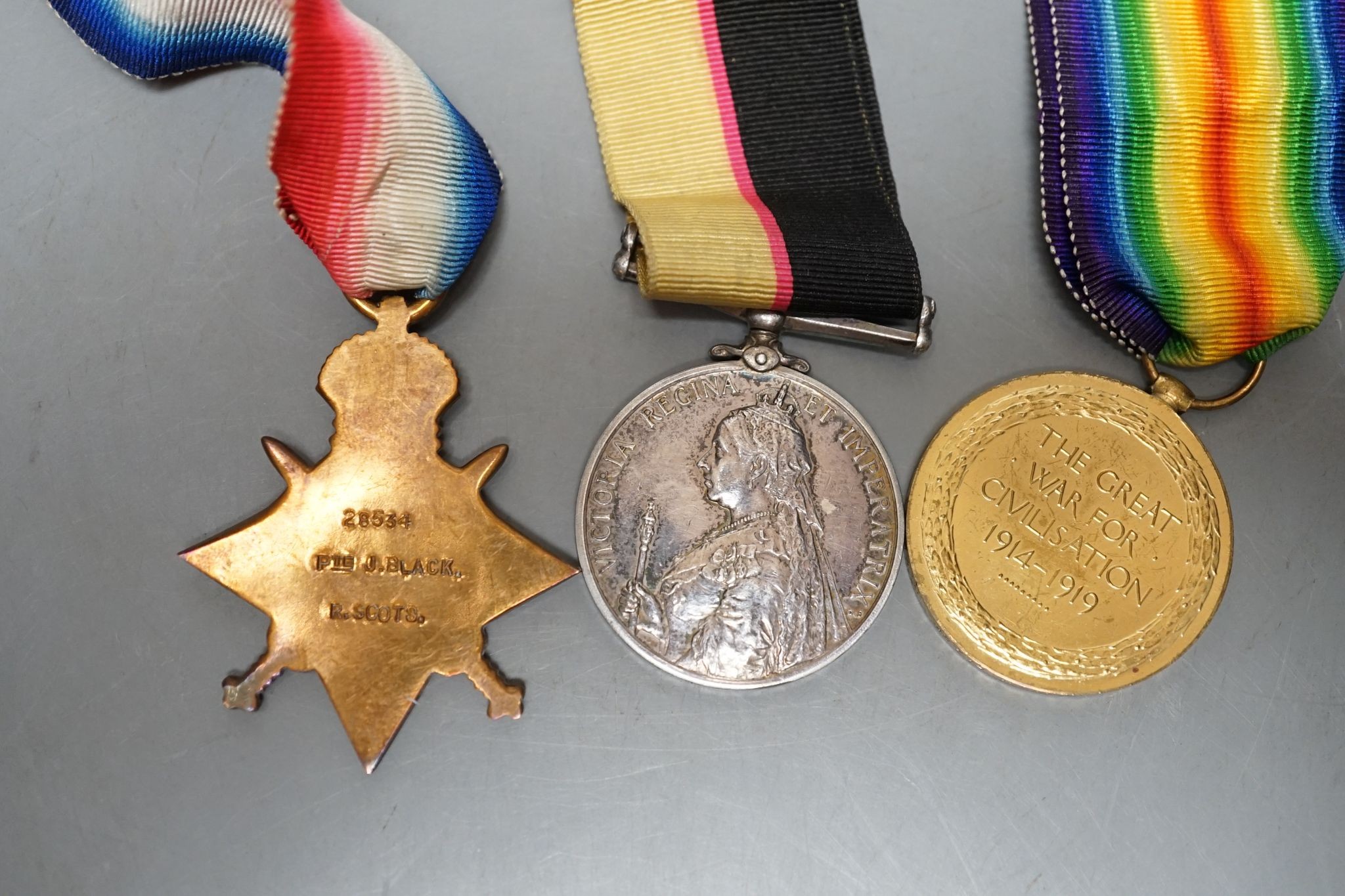 A medal trio awarded to Pte J Black, to include a Queen's Sudan, 1899